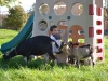 Our son plays with the goats on Fort Caprine