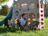 Our son plays with the goats on Fort Caprine